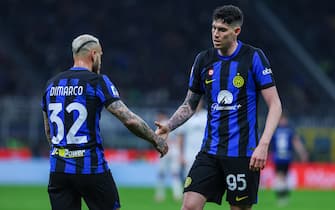 Alessandro Bastoni of FC Internazionale (R) celebrates with Federico Dimarco of FC Internazionale (L) during Serie A 2023/24 football match between FC Internazionale and Atalanta BC at Giuseppe Meazza Stadium, Milan, Italy on February 28, 2024