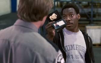 USA. Eddie Murphy in a scene from the ©Paramount Pictures movie: Beverly Hills Cop (1984).
Plot: A freewheeling Detroit cop - Axel Foley , pursuing a murder investigation finds himself dealing with the very different culture of Beverly Hills. 
Ref:  LMK110-J6744-170820
Supplied by LMKMEDIA. Editorial Only.
Landmark Media is not the copyright owner of these Film or TV stills but provides a service only for recognised Media outlets. pictures@lmkmedia.com
