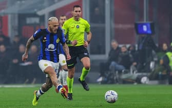 Federico Dimarco of FC Internazionale seen in action during Serie A 2023/24 football match between AC Milan and FC Internazionale at San Siro Stadium, Milan, Italy on April 22, 2024