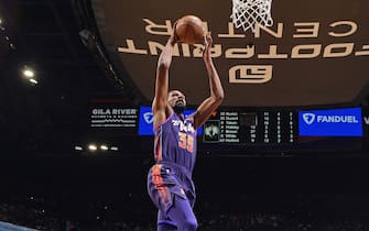 PHOENIX, AZ - MARCH 9: Kevin Durant #35 of the Phoenix Suns dunks the ball during the game against the Boston Celtics on March 9, 2024 at Footprint Center in Phoenix, Arizona. NOTE TO USER: User expressly acknowledges and agrees that, by downloading and or using this photograph, user is consenting to the terms and conditions of the Getty Images License Agreement. Mandatory Copyright Notice: Copyright 2024 NBAE (Photo by Barry Gossage/NBAE via Getty Images)