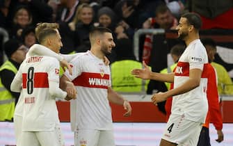 epa11145428 Stuttgart's Deniz Undav (C) celebrates with teammates after scoring the 3-0 lead during the German Bundesliga soccer match between VfB Stuttgart and 1. FSV Mainz 05 in Stuttgart, Germany, 11 February 2024.  EPA/RONALD WITTEK CONDITIONS - ATTENTION: The DFL regulations prohibit any use of photographs as image sequences and/or quasi-video.