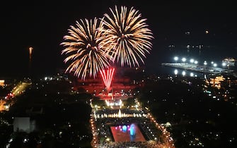 Fireworks light up the sky over Rizal Park in Manila to  celebrate during New Year celebrations on January 1, 2023. (Photo by JAM STA ROSA / AFP) (Photo by JAM STA ROSA/AFP via Getty Images)
