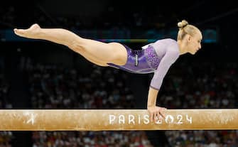 epa11527250 Alice D'Amato of Italy competes in the Women Balance Beam final of the Artistic Gymnastics competitions in the Paris 2024 Olympic Games, at the Bercy Arena in Paris, France, 05 August 2024.  EPA/CAROLINE BREHMAN