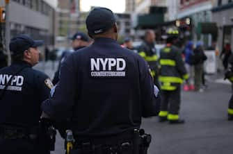 epa10579280 New York City Police Department Couterterrosim Unit officers work the scene of a parking structure collapse in the Financial District of New York City, New York, USA, 18 April 2023. Fire Department officials have reported three injuries but advised they expect that to increase.  EPA/JUSTIN LANE