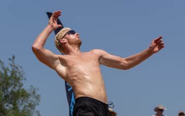 AUSTIN, TX - MAY 08: Chase Budinger jumps as he prepares to spike the ball during the Men's Championship Final during the AVP Pro Series Austin Open on May 8, 2022, at Krieg Field in Austin, Texas.  (Photo by David Buono/Icon Sportswire via Getty Images)