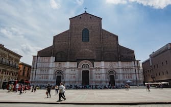 People and tourist are seen in Piazza Maggiore square in Bologna, Italy, on May 25, 2022. San Petronio Church is the most important church in the square. (Photo by Lorenzo Di Cola/NurPhoto via Getty Images)