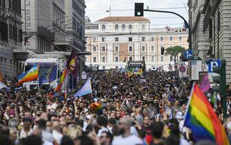 Members and supporters of the lesbian, gay, bisexual and transgender (LGBT) community take part in the Pride parade in Rome, Italy, 11 June 2022. ANSA/RICCARDO ANTIMIANI