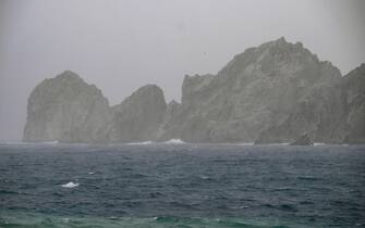 TOPSHOT - View of a rock formation at the Pacific Ocean before the arrival of hurricane Hilary at Los Cabos resort in Baja California state, Mexico on August 18, 2023. Hurricane Hilary strengthened into a major storm in the Pacific on Friday and was expected to further intensify before approaching Mexico's Baja California peninsula over the weekend, forecasters said. (Photo by ALFREDO ESTRELLA / AFP) (Photo by ALFREDO ESTRELLA/AFP via Getty Images)