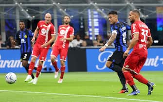 Inter Milan’s Lautaro Martinez (L) scores goal of 1 to 0 during the Italian serie A soccer match between Fc Inter  and Monza Giuseppe Meazza stadium in Milan, 19 August 2023.
ANSA / MATTEO BAZZI