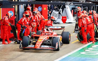 SILVERSTONE CIRCUIT, UNITED KINGDOM - JULY 07: Charles Leclerc, Ferrari SF-24, makes a pit stop during the British GP at Silverstone Circuit on Sunday July 07, 2024 in Northamptonshire, United Kingdom. (Photo by Andy Hone / LAT Images)