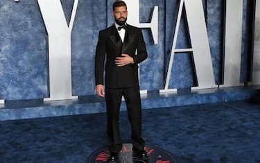 epa10519701 Ricky Martin arrives at the 2023 Vanity Fair Oscar Party following the 95th annual Academy Awards ceremony, at the Wallis Annenberg Center for the Performing Arts in Beverly Hills, California, USA, 12 March 2023. The Oscars are presented for outstanding individual or collective efforts in filmmaking in 24 categories.  EPA/NINA PROMMER