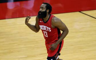 HOUSTON, TEXAS - JANUARY 10: James Harden #13 of the Houston Rockets reacts to a basket during the first quarter of a game against the Los Angeles Lakers at Toyota Center on January 10, 2021 in Houston, Texas. NOTE TO USER: User expressly acknowledges and agrees that, by downloading and or using this photograph, User is consenting to the terms and conditions of the Getty Images License Agreement. (Photo by Carmen Mandato/Getty Images)