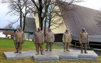 A picture taken on December 14, 2011 shows national monument made by Haakon Fageraas of the first people to reach the South Pole in Oslo. Norway's prime minister and several hundred scientists and adventurers gathered at the South Pole today to celebrate its conquest 100 years ago, also highlighting the threat of climate change. On December 14, 1911, not long before the outbreak of World War I as nationalism was on the rise in Europe, Norwegian explorer Roald Amundsen and the four members of his team, Helmer Hanssen, Oscar Wisting, Olav Bjaaland and Sverre Hassel , were the first to arrive at the southernmost tip of the globe, planting a Norwegian flag at the pole to mark their epic victory over British adventurer Robert Scott.  AFP PHOTO / SCANPIX NORWAY / CORNELIUS POPPE  ***NORWAY OUT***        (Photo credit should read CORNELIUS POPPE/AFP via Getty Images)