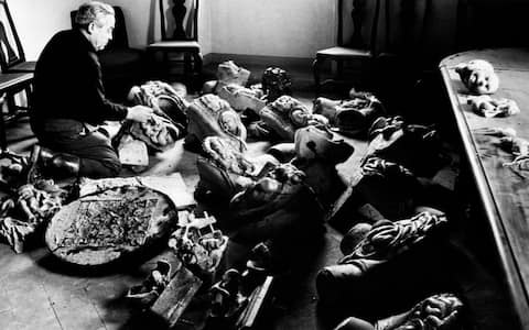 Man verifyng the damages to the objects of his shop caused by the flood of the Arno River. Florence, November 1966. (Photo by Mondadori via Getty Images)