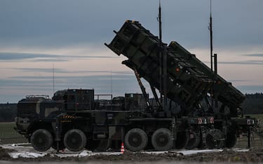 ZAMOSC, POLAND - FEBRUARY 18: Patriot launchers modules mounted on M983 HEMTT part of the US made MIM-104 Patriot surface-to-air missile (SAM) system are pictured on a open field on February 18, 2023 in Zamosc, Poland. The German armed forces deployed Patriots batteries to their NATO neighbor, after a missile explosion in Przewodow, which previous investigation suggests that came from Ukrainian air defense, killed two civilians. Since Russia's large scale military attack on Ukraine on February 24, 2022 more than 9.7 million refugees from Ukraine crossed the Polish borders to escape the conflict, with 1.4 million registering in Poland whilst others moved on to other countries. (Photo by Omar Marques/Getty Images)