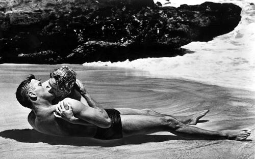 Burt Lancaster and Deborah Kerr, shown here in a famous scene still from the 1953 Academy Award®-winning film "From Here to Eternity," both received Oscar® nominations for their roles in the film.  Lancaster was nominated in the Best Actor category for his portrayal of Sgt. Milton Warden while Kerr received a Best Actress nomination for her role of "Karen Holmes." The film received 13 nominations in total and won eight Oscars® including Best Picture. Restored by Nick & jane for Dr. Macro's High Quality Movie Scans Website: http:www.doctormacro.com. Enjoy!