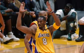 LOS ANGELES - JANUARY 7:  Kobe Bryant #8 of the Los Angeles Lakers gestures after scoring one of his twelve three pointers during the NBA game against the Seattle Sonics at Staples Center on January 7, 2003 in Los Angeles, California. Bryant scored 45 points and set NBA records with nine consecutive 3-pointers and 12 overall as the Los Angeles Lakers defeated the Seattle SuperSonics 119-98.  NOTE TO USER: User expressly acknowledges and agrees that, by downloading and/or using this Photograph, User is consenting to the terms and conditions of the Getty Images License Agreement.  Mandatory copyright notice: Copyright 2003 NBAE.  (Photo by Noah Graham/NBAE via Getty Images) 