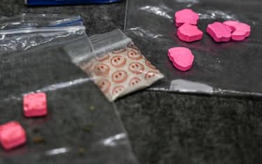 Ketamine, Extasis, MDMA and Mezcaline are picture before being mixed to produce a powder known as Tussi or pink cocaine in Medellin, Colombia, on April 2, 2022. - Three decades after Pablo Escobar's shot body was left on a Medellin rooftop, drug trafficking continues and, at present, markets for flavored cocaine, local crack, pharmaceutical drugs and ketamine-based hallucinogens are rife for in his hometown. (Photo by JOAQUIN SARMIENTO / AFP) (Photo by JOAQUIN SARMIENTO/AFP via Getty Images)