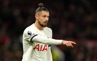 Tottenham Hotspur's Radu Dragusin during the Premier League match at Old Trafford, Manchester. Picture date: Sunday January 14, 2024.