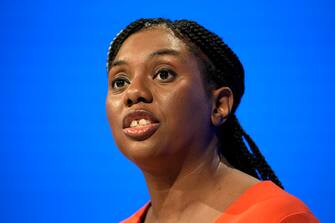 MANCHESTER, ENGLAND - OCTOBER 02: Kemi Badenoch MP, Secretary of State for Business and Trade speaks during the second day of the the Conservative Party Conference on October 02, 2023 in Manchester, England. Chancellor of the Exchequer Jeremy Hunt will deliver his keynote speech to delegates at The Conservative Party Conference, at Manchester Central, and is expected to announce changes to the UK's benefits system and raise the living wage (Photo by Christopher Furlong/Getty Images)