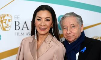 epa10477907 Michelle Yeoh  and Jean Todt arrive for the 2023 EE BAFTA Film Awards ceremony at the Southbank Centre in London, Britain, 19 February 2023. The event is hosted by the British Academy of Film and Television Arts (BAFTA).  EPA/NEIL HALL