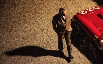USA. Adam Driver in the (C)Neon new film: Ferrari (2023). 
Plot: Set in the summer of 1957, with Enzo Ferrari's auto empire in crisis, the ex-racer turned entrepreneur pushes himself and his drivers to the edge as they launch into the Mille Miglia, a treacherous 1,000-mile race across Italy.  
Ref: LMK106-J10340-011223
Supplied by LMKMEDIA. Editorial Only. Landmark Media is not the copyright owner of these Film or TV stills but provides a service only for recognised Media outlets. pictures@lmkmedia.com