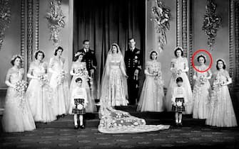 File photo dated 20/11/47 of the Duke of Edinburgh and Queen Elizabeth II with their bridesmaids (left to right) The Hon. Margaret Elphinstone, The Hon. Pamela Mountbatten, Lady Mary Cambridge, Princess Alexandra of Kent, Princess Margaret, Lady Caroline Montagu-Douglas-Scott, Lady Elizabeth Lambart and The Hon. Diana Bowes-Lyon in the Throne Room at Buckingham Palace immediately after their wedding ceremony. The Duke of Edinburgh has died, Buckingham Palace has announced. Issue date: Friday April 9, 2020.. See PA story DEATH Philip. Photo credit should read: PA/PA Wire