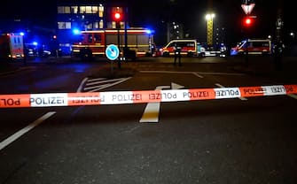 epa10512739 Emergency workers and police gather at the scene of a shooting in Hamburg, Germany, 09 March 2023. According to police, the shooting took place around 9 pm, killing seven people and injuring at least eight others. The gunman is believed to be among the several dead found in the building, police said.  EPA/NEWS5     BEST QUALITY AVAILABLE