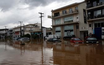 epa10843209 A flooded road, during the storm named Daniel in the area of Volos, Magnesia, Greece, 06 September 2023. The storm 'Daniel' sweeping through most of Greece with heavy rain and lightning caused extensive damage in the power network at Volos, Mt. Pilio, elsewhere in the Magnissia prefecture, as well as in the Sporades Islands.  EPA/YANNIS KOLESIDIS