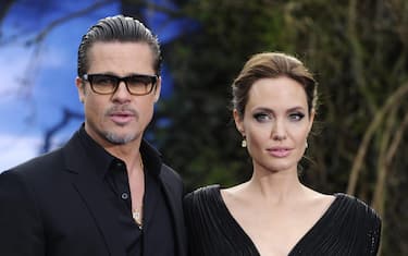 US actress Angelina Jolie (R) and US actor Brad Pitt (L) arrive for a special Maleficent costume display at Kensington Palace in London, Britain, 08 May 2014. The fantasy movie 'Maleficent' will be released in the UK on 28 May.  ANSA/FACUNDO ARRIZABALAGA