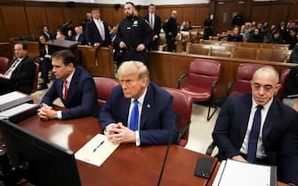 epa11293982 Former US President and current Republican presidential candidate Donald Trump awaits the start of proceedings at Manhattan Criminal Court in New York, New York, USA, 22 April 2024. Trump is facing 34 felony counts of falsifying business records related to payments made to adult film star Stormy Daniels during his 2016 presidential campaign.  EPA/YUKI IWAMURA / POOL