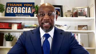 epa08921396 A video grab shows US Democratic Senate candidate Rev. Raphael Warnock speaking via his YouTube channel after midnight as votes continue to be counted in Atlanta, Georgia, USA, 06 January 2021. Republican Senator David Perdue is running against Democrat Jon Ossoff and Republican Senator Kelly Loeffler is running against Democrat Rev. Raphael Warnock in the 05 January 2021 runoff election.  EPA/RAPHAEL WARNOCK VIA YOUTUBE EDITORIAL USE ONLY, NO SALES