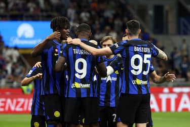 Inter Milan s Marcus Thuram jubilates with his teammates after scoring goal of 1 to 0 during the Italian serie A soccer match between Fc Inter  and Cagliari  at  Giuseppe Meazza stadium in Milan, 14 April 2024.
ANSA / MATTEO BAZZI
