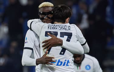 REGGIO NELL'EMILIA, ITALY - FEBRUARY 28: Khvicha Kvaratskhelia of Napoli SSC celebrates after scoring his team's fifth goal with his teammate Victor Osimhen of Napoli SSC during the Serie A TIM match between US Sassuolo and SSC Napoli at Mapei Stadium - Citta' del Tricolore on February 28, 2024 in Reggio nell'Emilia, Italy. (Photo by Emmanuele Ciancaglini/Ciancaphoto Studio/Getty Images)