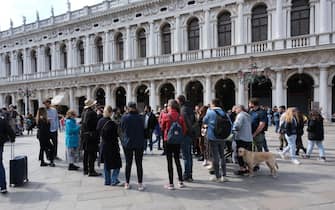 Tourists in St. Mark's Square in Venice, Italy, April 2, 2023.