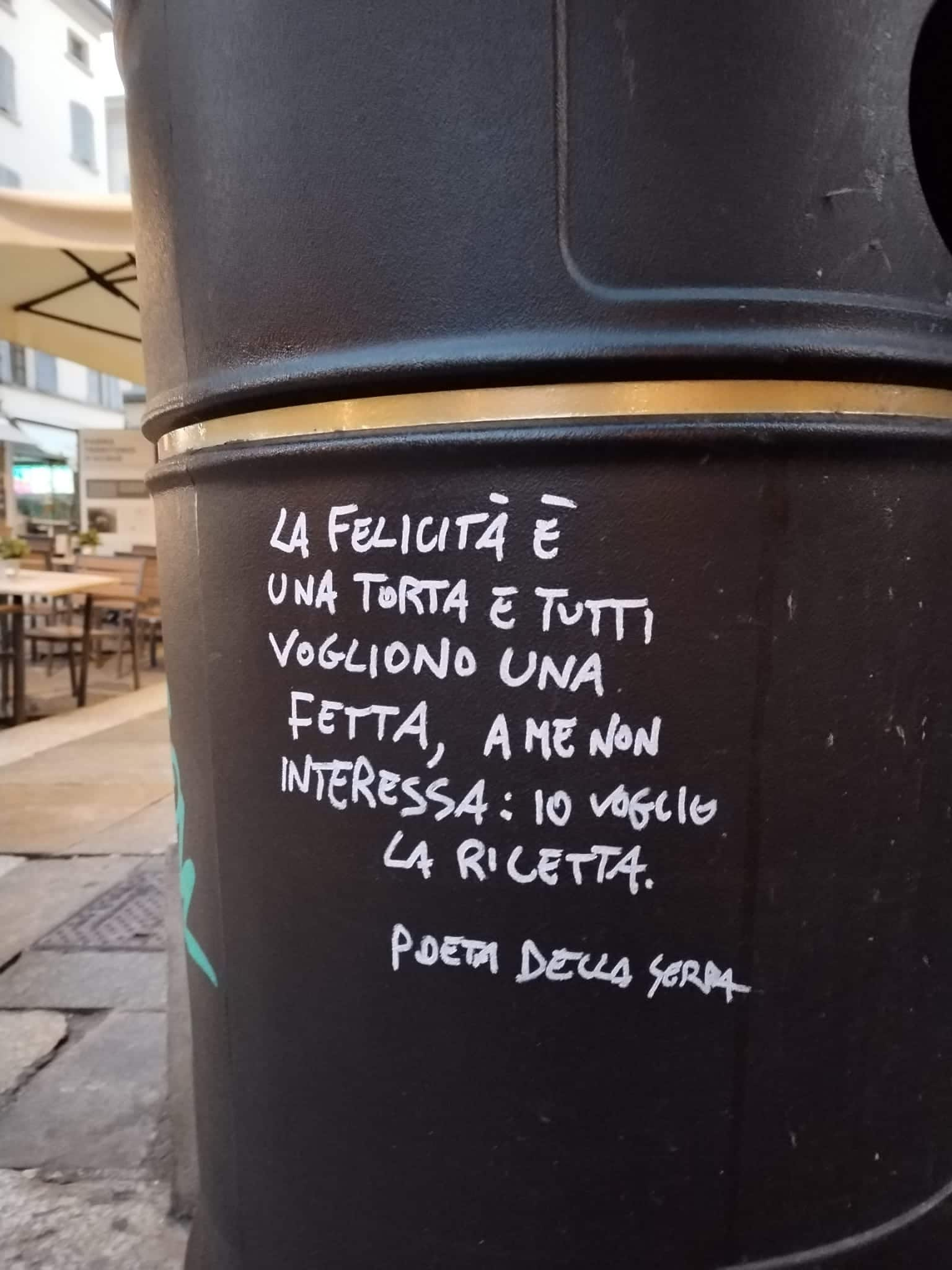 poesia di Poeta della Serra su cassonetto Roma