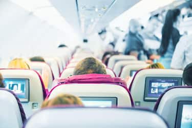 Interior of airplane with passengers