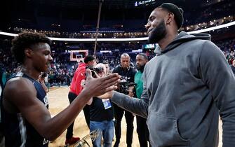 COLUMBUS, OH - DECEMBER 14: LeBron 'Bronny' James Jr. #0 of Sierra Canyon High School is greeted by his father LeBron James of the Los Angeles Lakers following the Ohio Scholastic Play-By-Play Classic against St. Vincent-St. Mary High School at Nationwide Arena on December 14, 2019 in Columbus, Ohio. (Photo by Joe Robbins/Getty Images)