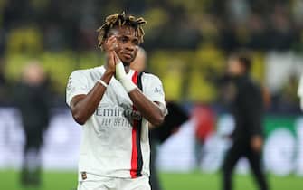 epa10900639 Milan s Samuel Chukwueze reacts after the UEFA Champions League Group F match between Borussia Dortmund and AC Milan in Dortmund, Germany, 04 October 2023.  EPA/CHRISTOPHER NEUNDORF