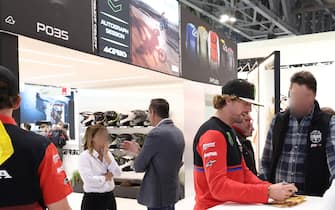 Adrien Van Beveren MILAN, ITALY - NOVEMBER 07: Adrien Van Beveren signing autographs at the Acerbis stand during the 110th EICMA - International Motorcycle and Accessories Exhibition 2024, held at Fiera Milano Rho on November 7, 2024, in Milan, Italy. (Photo by Pietro D'Aprano/Getty Images)