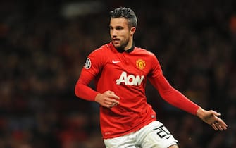 epa03985593 Manchester United's Robin Van Persie in action during the UEFA Champions League group A soccer match between Manchester United and Shakhtar Donetsk at Old Trafford in Manchester, Britain, 10 December 2013. ManU won 1-0.  EPA/PETER POWELL