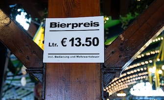 14 September 2023, Bavaria, M?nchen: A sign with the inscription Ã Bierpreis 13,50 EuroÃ  can be seen in a beer tent on the Theresienwiese. The 188th Wiesn will take place this year from 16.09.- 03.10.2023. Photo: Sven Hoppe/dpa (Photo by Sven Hoppe/picture alliance via Getty Images)