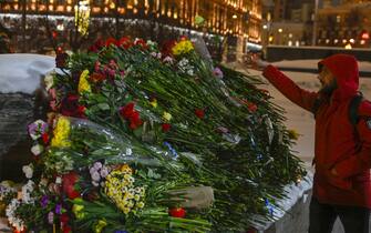 MOSCOW, RUSSIA - FEBRUARY 16: Some citizens lay flowers at the Solovetsky Stone to commemorate the Russian opposition leader Alexei Navalny after he died in a prison colony where he was serving his sentence, in Moscow, Russia on February 16, 2024. (Photo by Stringer/Anadolu via Getty Images)