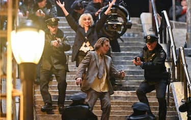 NEW YORK, NEW YORK - APRIL 03:  Lady Gaga and Joaquin Phoenix are seen on the set of "Joker: Folie a Deux" at Shakespeare Steps in the Bronx on April 03, 2023 in New York City. (Photo by James Devaney/GC Images)