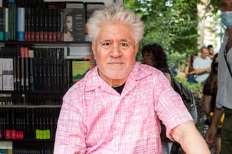 MADRID, SPAIN - JUNE 08: Pedro Almodovar at one of the booths of the 2022 Book Fair, in El Retiro Park, on June 08, 2022 in Madrid, Spain. The Madrid Book Fair 2022 will be 'the largest of the 21st Century' with 378 booths with more than 400 exhibitors. The 81st edition of this literary event will run from Friday, May 27 to Sunday, June 5. In this edition, the Book Fair, in line with the European Year of Youth, has prepared a special program designed for young people and today will devote part of its program to this audience. (Photo by David Benito/Getty Images)