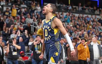 INDIANAPOLIS, IN - JANUARY 3: Tyrese Haliburton #0 of the Indiana Pacers celebrates during the game against the Milwaukee Bucks on January 3, 2024 at Gainbridge Fieldhouse in Indianapolis, Indiana. NOTE TO USER: User expressly acknowledges and agrees that, by downloading and or using this Photograph, user is consenting to the terms and conditions of the Getty Images License Agreement. Mandatory Copyright Notice: Copyright 2024 NBAE (Photo by Jeff Haynes/NBAE via Getty Images)