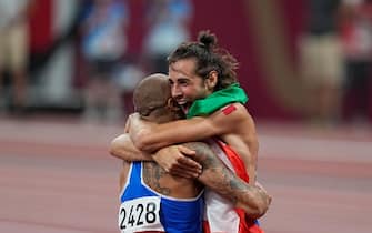 Gianmarco Tamberi and Lamont Marcell Jacobs celebrating100 meter win for men at the Tokyo Olympics, Tokyo Olympic stadium, Tokyo, Japan on August 1, 2021. (Photo by Ulrik Pedersen/NurPhoto via Getty Images)