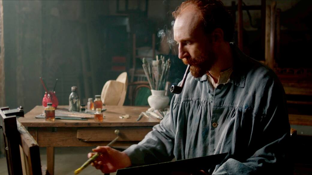 Vincet_with_brush_©_Exhibition_on_Screen_background.jpeg