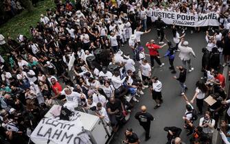 NANTERRE, FRANCE - JUNE 29: Mounia, mother of the French teenager killed by police, attends a memorial march for her son Nahel on June 29, 2023 in Nanterre, France. A French teenager of North African origin was shot dead by police on June 27th, the third fatal traffic stop shooting this year in France - causing nationwide unrest and clashes with police forces. On June 28th, the victim's family called for a memorial march starting at Nanterre's main police station on June 29th. (Photo by Abdulmonam Eassa/Getty Images)