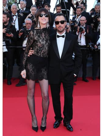 CANNES, FRANCE - MAY 18: Charlotte Gainsbourg and Anthony Vaccarello attend the "Emilia Perez" Red Carpet at the 77th annual Cannes Film Festival at Palais des Festivals on May 18, 2024 in Cannes, France. (Photo by JB Lacroix/FilmMagic)